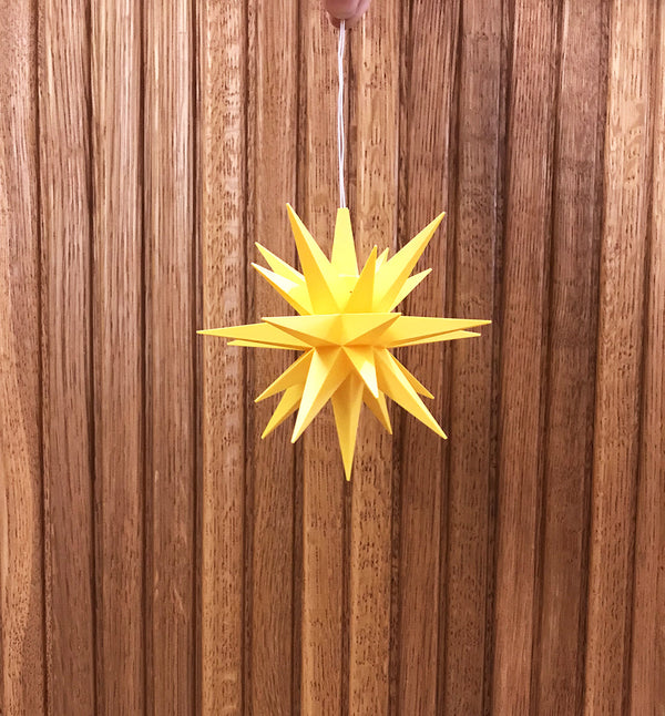 Gul ministjärna från tyska Herrnhuter. Moldavien star 13 cm.