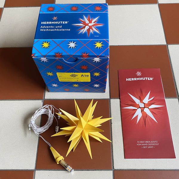 Gul ministjärna från tyska Herrnhuter. Moldavien star 13 cm.
