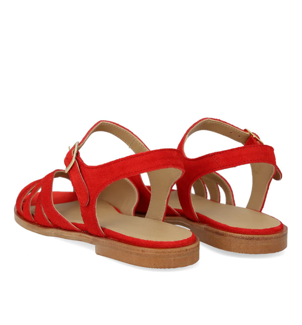 Röd sandal från danska Angulus. Sandalen har rund tå, justerbar vristrem med spänne, vadderad lädersula och en lätt tunitsula. Tillverkad i naturligt läder som andas. Designad i Danmark och handgjord i Portugal.

Färg: Korallröd

Passform: Normal

Material: Mocka
Foder: Läderfoder
Sula: Tunit