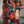 Load image into Gallery viewer, Kimono Gro från Liebling i tyget Otti. En lång lyxig kimono med fina kragdetaljer. Band att knyta i midjan. Kimonon är one size.   Färg: Mintgrön, cerise, gulorange och beigea blad och blommor på svart botten.  Material: 100% viskos. Exklusivt vintagetyg från 80-talet, tryckt i Sverige. 
