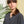 Load image into Gallery viewer, Jackie kimonojacka är lite boxig i modellen, v-ringad, två stora fickor fram, ok i ryggen och fyra knappar fram.&nbsp;&nbsp;

Färg: Svart/vit rutig

Material: 98% bomull, 2% elastan&nbsp;

Materialursprung:&nbsp;Detta tyg är ett deadstock tyg och kommer från Portugal.
