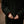 Load image into Gallery viewer, Lieblings kappa Luna! Avslappnad modell i Shetlandsull. Raglanärm, stora fickor med lock och veck med knapp vid ärmslut. Helfodrad med brunt glansigt foder från Italien. Bruna corozo-knappar fram, sprund bak.   Färg: Mossgrön   Material:  Yttertyg: 100% Shetlandsull
