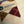 Load image into Gallery viewer, Strumpor i merinoull från Woolsens i klassiskt argyle-mönster.

Färg: Sand, brun, burgundy, korall.

Material: 70% merinoull, 27% polyamid,3% elastan.

Skötselråd: Ulltvätt

Tillverkade i: Spanien
