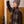Load image into Gallery viewer, En smal stickad halsduk med rutig design och fransar. Storlek 15x190 cm. Stickad i ofärgad yakull.

Maskinstickad på några timmar av en lokal partner i Katmandu, Nepal. DINADI genomför månatliga platsbesök för att säkerställa att DINADIs etiska och miljömässiga standarder upprätthålls.

Färg: Rutig i brunt

Material: Tillverkad av 100 % ofärgad yakull

