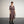 Load image into Gallery viewer, Klänning Björk Äng från Liebling. Med resår i midjan, fickor i sidorna och armveckslång ärm. Brett band att knyta i midjan. Ekologisk viskos. Småblommigt tyg med rosa, ljuslila, cerise och grönt på svart botten.
